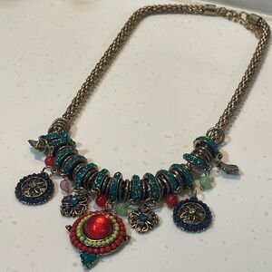 Bohemian Artisan Necklace with Vibrant Red and Blue Details